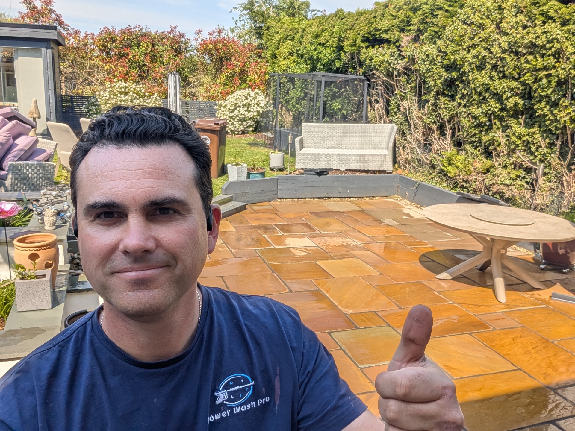 Andrew, owner of Power Wash Pro, outside a home in Thame, Oxfordshire