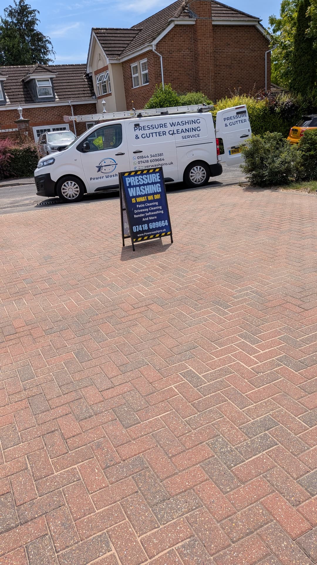 Power Wash Pro van on a residential block paving driveway after cleaning