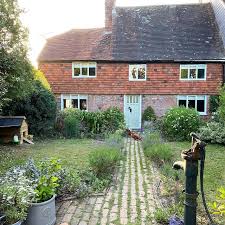 Gutter cleaning on 18th century Long Crendon cottage